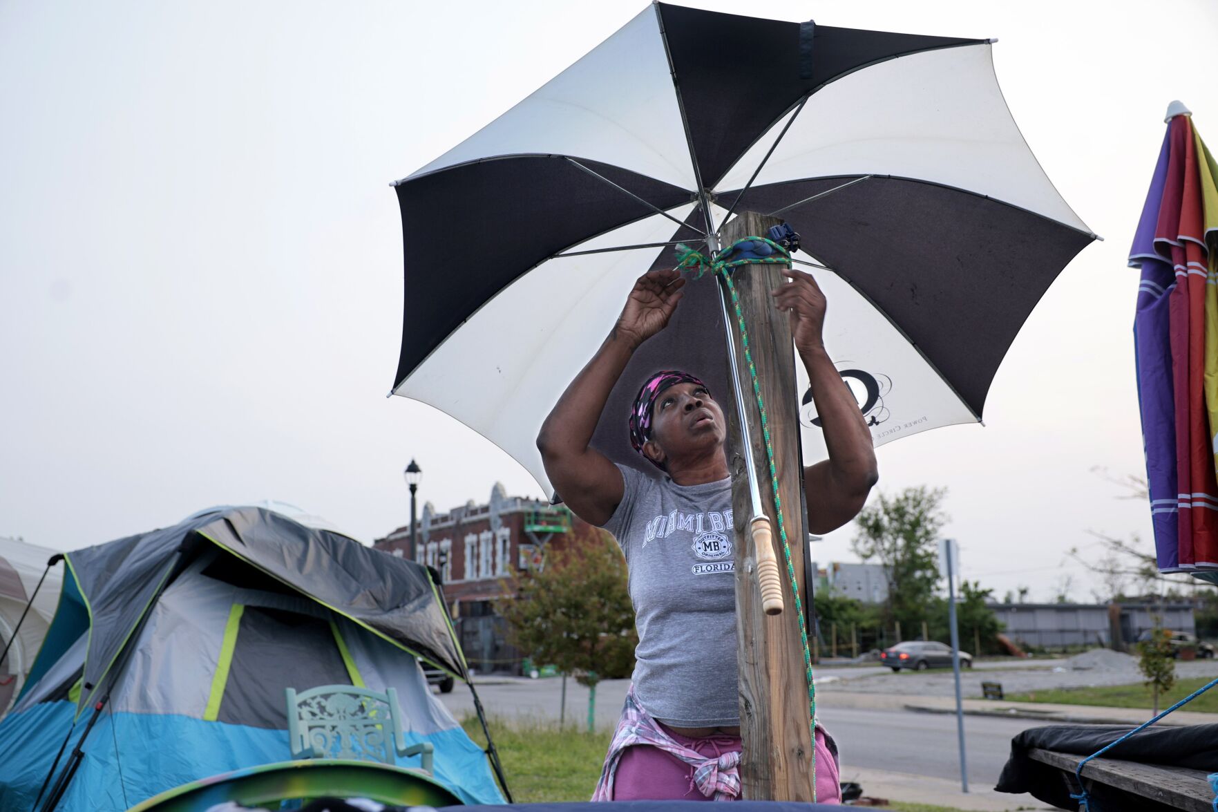 Tornado victims cling to their property, despite the damage